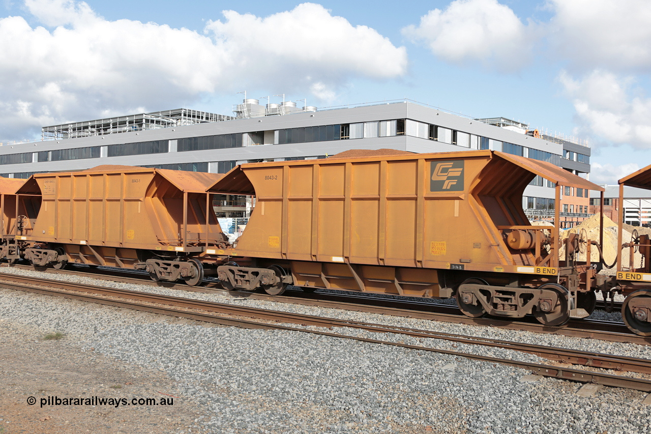 140601 4631
Midland, loaded iron ore train #1030 heading to Kwinana, CFCLA leased CHEY type waggon CHEY 8043 one pair of 120 bar coupled pairs built by Bluebird Rail Operations SA in 2011-12. 1st June 2014.
Keywords: CHEY-type;CHEY8043;Bluebird-Rail-Operations-SA;2011/120-43;