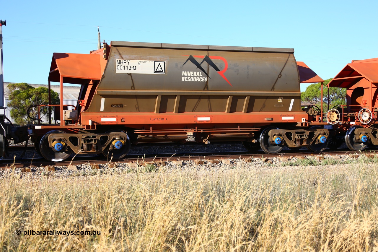 190107 0425
Parkeston, Mineral Resources Ltd MHPY type iron ore waggon MHPY 00113 built by CSR Yangtze Co China in 2014 as a batch of 382 units, these bottom discharge hopper waggons are operated in 'married' pairs.
Keywords: MHPY-type;MHPY00113;2014/382-113;CSR-Yangtze-Rolling-Stock-Co-China;