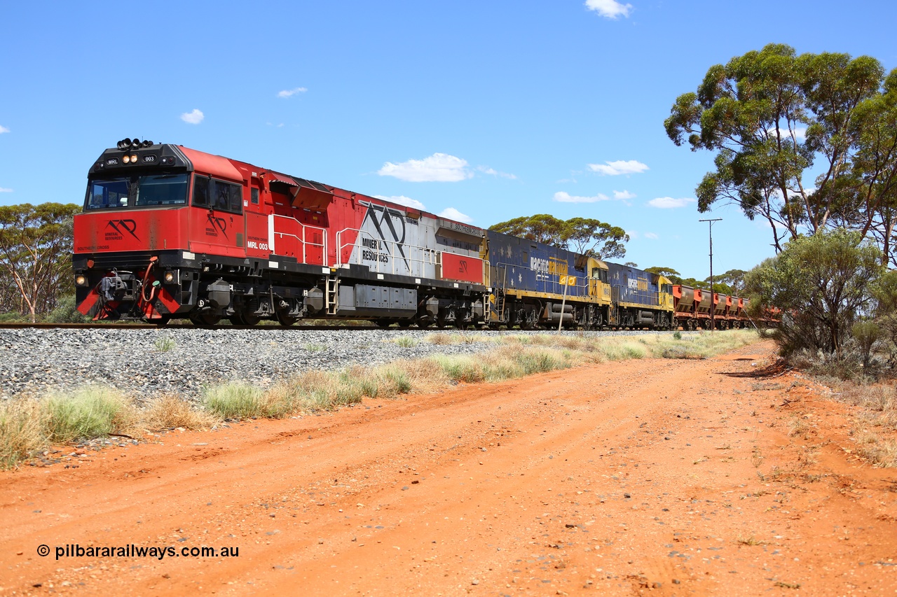 190107 0529
Binduli, following a crew change Mineral Resources empty iron ore train 2034 with Mineral Resources MRL class loco MRL 003 'Southern Cross' with serial R-0113-03/14-506 a UGL Rail Broadmeadow NSW built GE model C44ACi model leads two Pacific National NR class units NR 43 and NR 78 with 53 pairs of MHPYs and 2 single MHLY bottom discharge hopper waggons for 1293 metres and 2258 tonnes.
Keywords: MRL-class;MRL003;UGL-Rail-NSW;GE;C44ACi;R-0113-03/14-506;