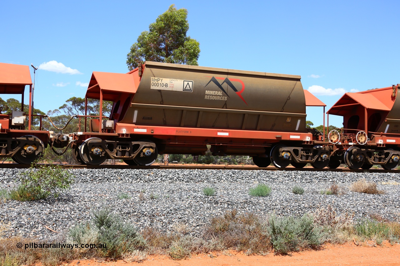 190107 0598
Binduli, on empty Mineral Resources Ltd iron ore train service from Esperance to Koolyanobbing 2034 with MRL's MHPY type iron ore waggon MHPY 00010 built by CSR Yangtze Co China serial 2014/382-10 in 2014 as a batch of 382 units, these bottom discharge hopper waggons are operated in 'married' pairs.
Keywords: MHPY-type;MHPY00010;2014/382-10;CSR-Yangtze-Rolling-Stock-Co-China;