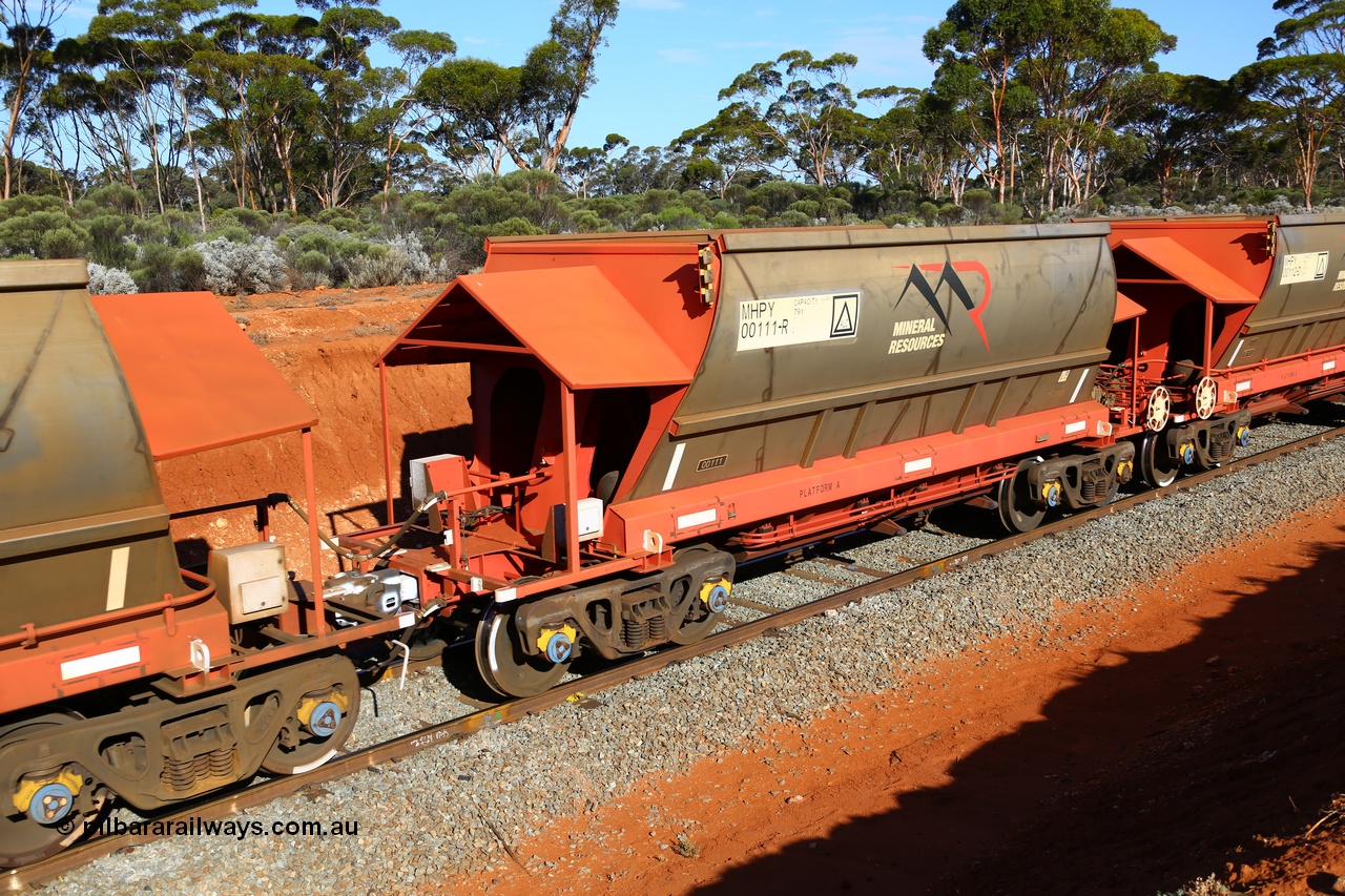 190109 1565
Binduli, Mineral Resources Ltd empty iron ore train 4030 with MRL's MHPY type iron ore waggon MHPY 00111 built by CSR Yangtze Co China serial 2014/382-111 in 2014 as a batch of 382 units, these bottom discharge hopper waggons are operated in 'married' pairs.
Keywords: MHPY-type;MHPY00111;2014/382-111;CSR-Yangtze-Rolling-Stock-Co-China;