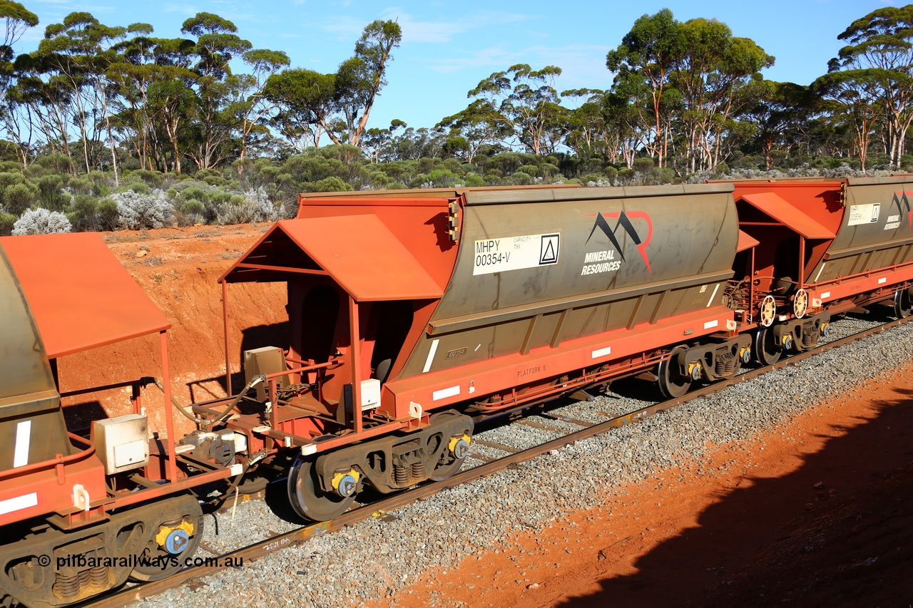 190109 1599
Binduli, Mineral Resources Ltd empty iron ore train 4030 with MRL's MHPY type iron ore waggon MHPY 00354 built by CSR Yangtze Co China serial 2014/382-354 in 2014 as a batch of 382 units, these bottom discharge hopper waggons are operated in 'married' pairs.
Keywords: MHPY-type;MHPY00354;2014/382-354;CSR-Yangtze-Rolling-Stock-Co-China;