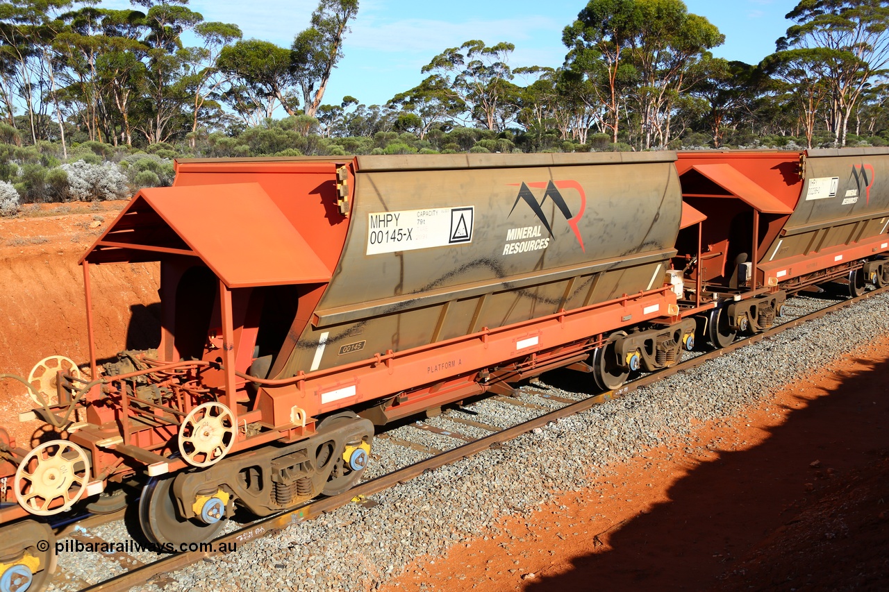 190109 1624
Binduli, Mineral Resources Ltd empty iron ore train 4030 with MRL's MHPY type iron ore waggon MHPY 00146 built by CSR Yangtze Co China serial 2014/382-146 in 2014 as a batch of 382 units, these bottom discharge hopper waggons are operated in 'married' pairs.
Keywords: MHPY-type;MHPY00145;2014/382-145;CSR-Yangtze-Rolling-Stock-Co-China;