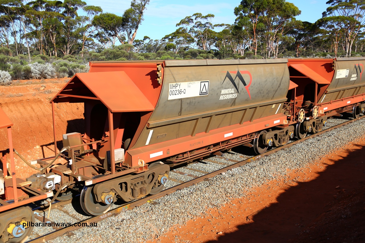 190109 1625
Binduli, Mineral Resources Ltd empty iron ore train 4030 with MRL's MHPY type iron ore waggon MHPY 00235 built by CSR Yangtze Co China serial 2014/382-235 in 2014 as a batch of 382 units, these bottom discharge hopper waggons are operated in 'married' pairs.
Keywords: MHPY-type;MHPY00236;2014/382-236;CSR-Yangtze-Rolling-Stock-Co-China;