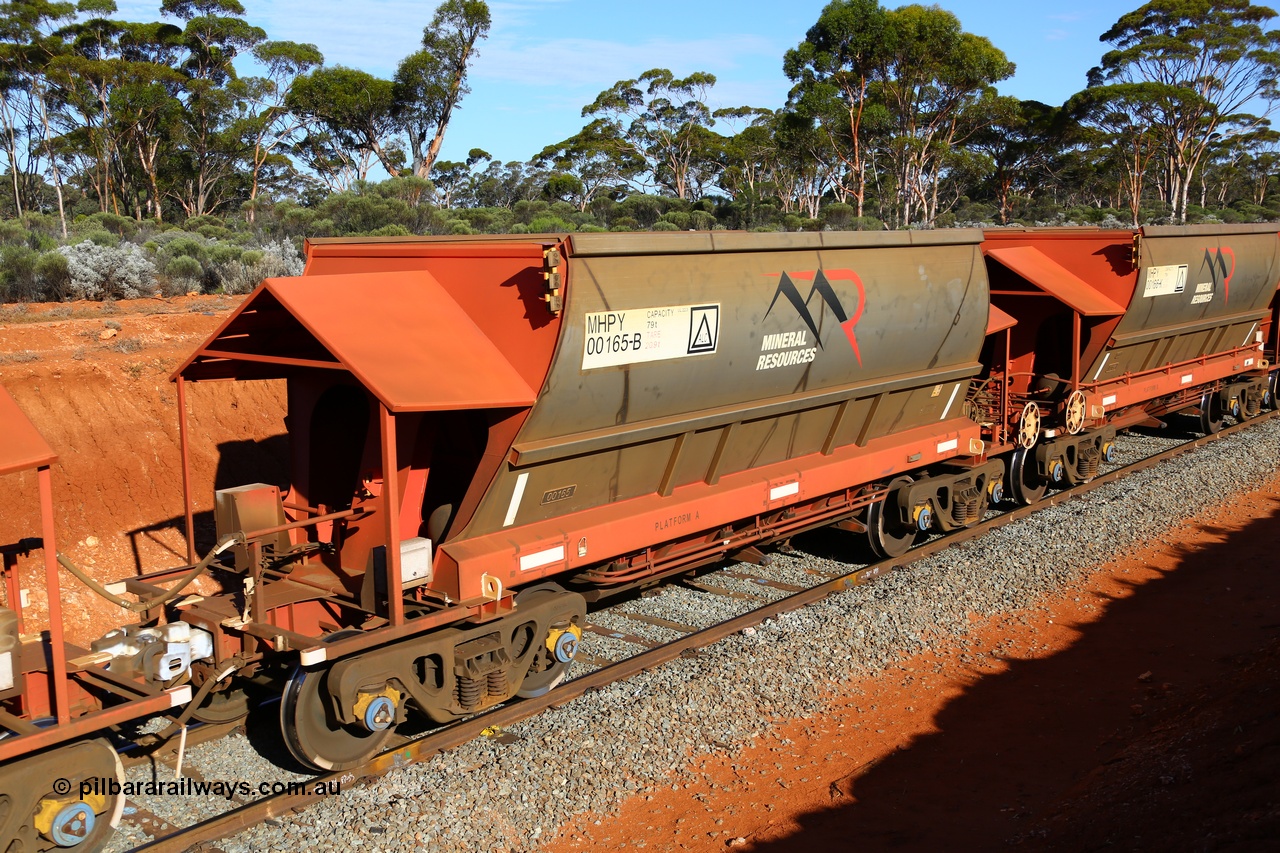 190109 1627
Binduli, Mineral Resources Ltd empty iron ore train 4030 with MRL's MHPY type iron ore waggon MHPY 00165 built by CSR Yangtze Co China serial 2014/382-165 in 2014 as a batch of 382 units, these bottom discharge hopper waggons are operated in 'married' pairs.
Keywords: MHPY-type;MHPY00165;2014/382-165;CSR-Yangtze-Rolling-Stock-Co-China;