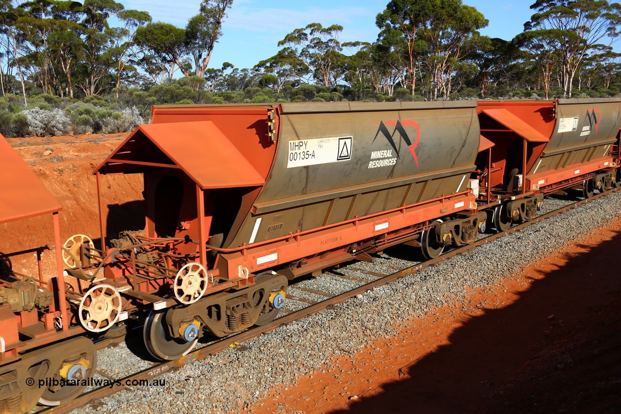 190109 1632
Binduli, Mineral Resources Ltd empty iron ore train 4030 with MRL's MHPY type iron ore waggon MHPY 00135 built by CSR Yangtze Co China serial 2014/382-135 in 2014 as a batch of 382 units, these bottom discharge hopper waggons are operated in 'married' pairs.
Keywords: MHPY-type;MHPY00135;2014/382-135;CSR-Yangtze-Rolling-Stock-Co-China;