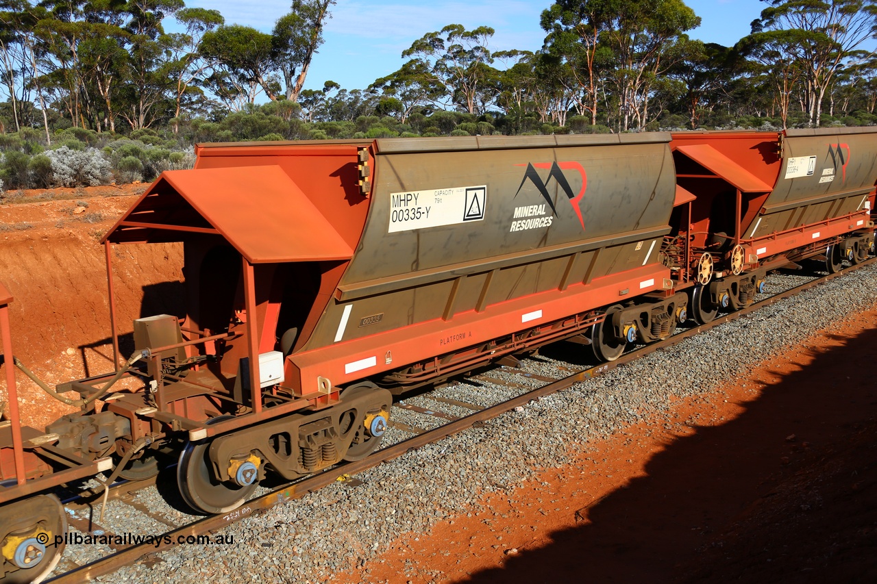 190109 1641
Binduli, Mineral Resources Ltd empty iron ore train 4030 with MRL's MHPY type iron ore waggon MHPY 00335 built by CSR Yangtze Co China serial 2014/382-335 in 2014 as a batch of 382 units, these bottom discharge hopper waggons are operated in 'married' pairs.
Keywords: MHPY-type;MHPY00335;2014/382-335;CSR-Yangtze-Rolling-Stock-Co-China;