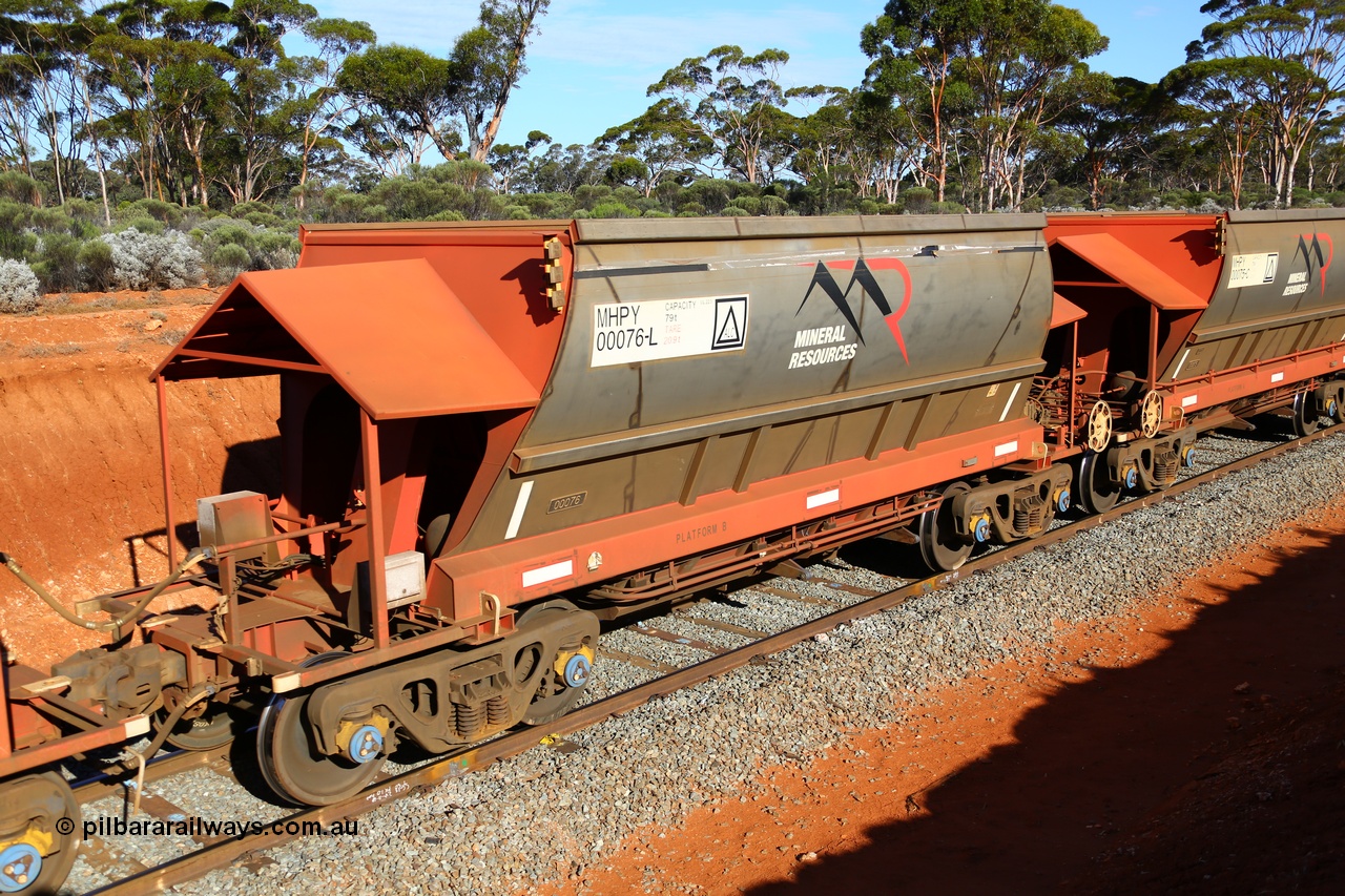 190109 1645
Binduli, Mineral Resources Ltd empty iron ore train 4030 with MRL's MHPY type iron ore waggon MHPY 00075 built by CSR Yangtze Co China serial 2014/382-75 in 2014 as a batch of 382 units, these bottom discharge hopper waggons are operated in 'married' pairs.
Keywords: MHPY-type;MHPY00076;2014/382-76;CSR-Yangtze-Co-China;