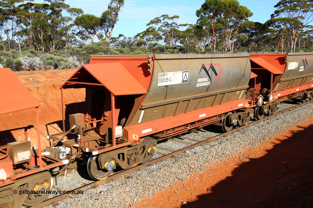 190109 1653
Binduli, Mineral Resources Ltd empty iron ore train 4030 with MRL's MHPY type iron ore waggon MHPY 00035 built by CSR Yangtze Co China serial 2014/382-35 in 2014 as a batch of 382 units, these bottom discharge hopper waggons are operated in 'married' pairs.
Keywords: MHPY-type;MHPY00035;2014/382-35;CSR-Yangtze-Co-China;