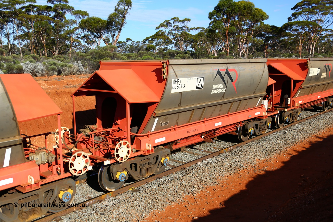 190109 1658
Binduli, Mineral Resources Ltd empty iron ore train 4030 with MRL's MHPY type iron ore waggon MHPY 00301 built by CSR Yangtze Co China serial 2014/382-301 in 2014 as a batch of 382 units, these bottom discharge hopper waggons are operated in 'married' pairs.
Keywords: MHPY-type;MHPY00301;2014/382-301;CSR-Yangtze-Co-China;