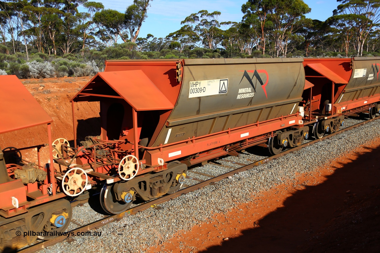 190109 1664
Binduli, Mineral Resources Ltd empty iron ore train 4030 with MRL's MHPY type iron ore waggon MHPY 00309 built by CSR Yangtze Co China serial 2014/382-309 in 2014 as a batch of 382 units, these bottom discharge hopper waggons are operated in 'married' pairs.
Keywords: MHPY-type;MHPY00309;2014/382-309;CSR-Yangtze-Co-China;