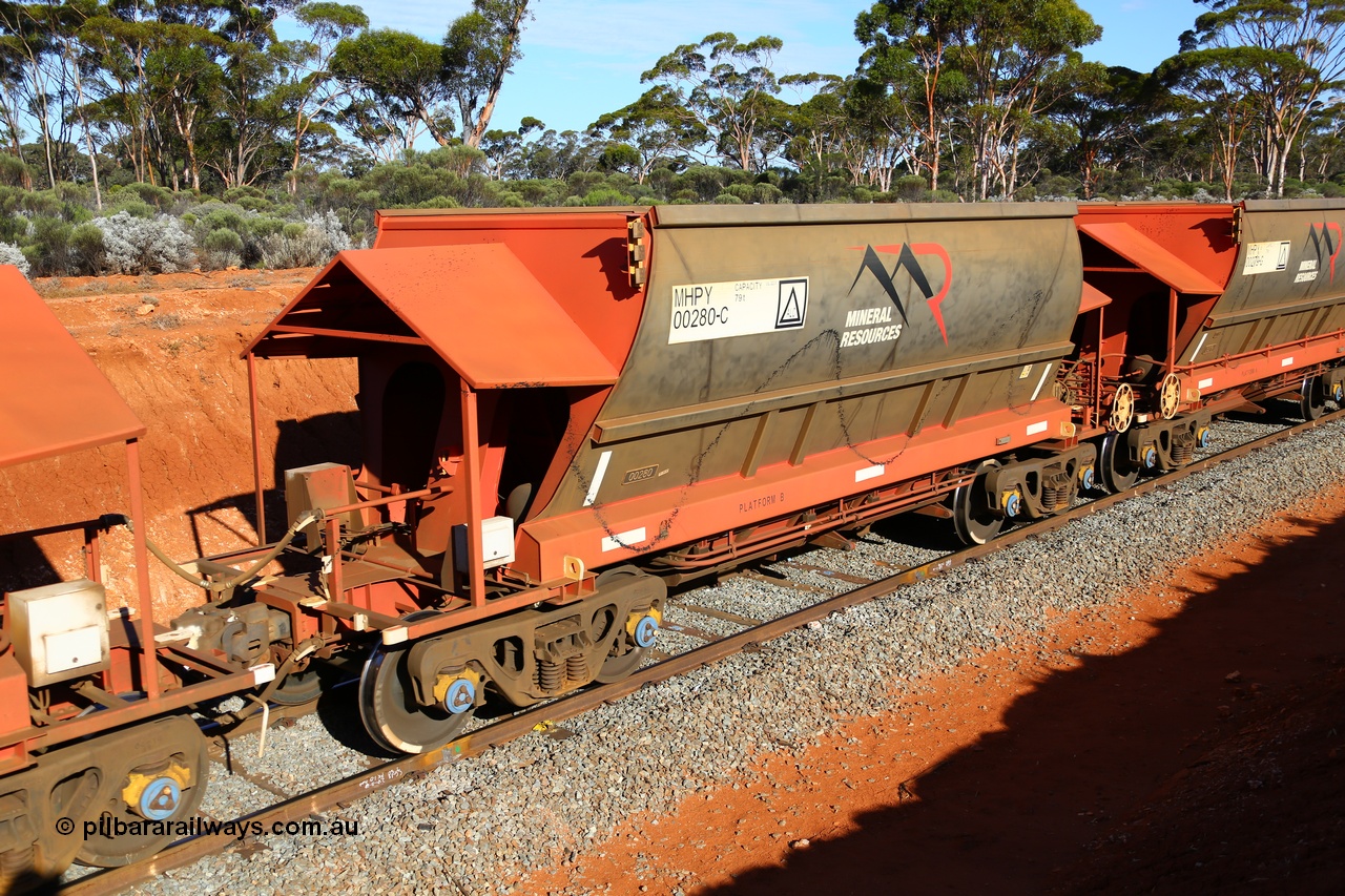 190109 1665
Binduli, Mineral Resources Ltd empty iron ore train 4030 with MRL's MHPY type iron ore waggon MHPY 00280 built by CSR Yangtze Co China serial 2014/382-280 in 2014 as a batch of 382 units, these bottom discharge hopper waggons are operated in 'married' pairs.
Keywords: MHPY-type;MHPY00280;2014/382-280;CSR-Yangtze-Co-China;