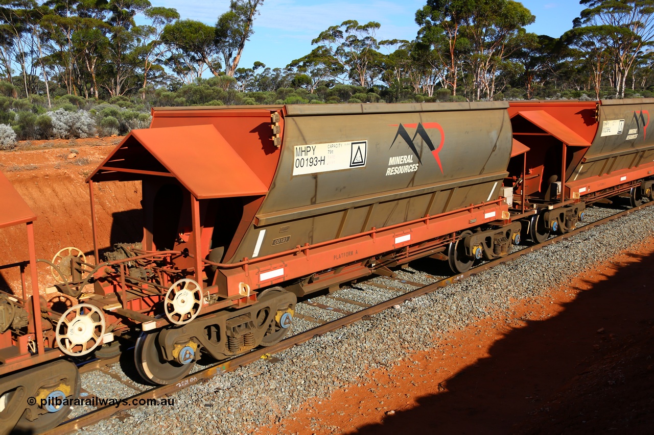 190109 1668
Binduli, Mineral Resources Ltd empty iron ore train 4030 with MRL's MHPY type iron ore waggon MHPY 00194 built by CSR Yangtze Co China serial 2014/382-194 in 2014 as a batch of 382 units, these bottom discharge hopper waggons are operated in 'married' pairs.
Keywords: MHPY-type;MHPY00193;2014/382-193;CSR-Yangtze-Co-China;