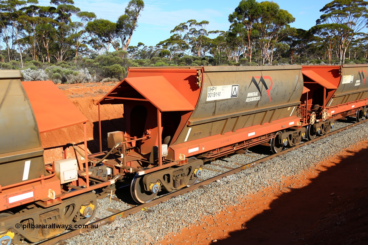 190109 1677
Binduli, Mineral Resources Ltd empty iron ore train 4030 with MRL's MHPY type iron ore waggon MHPY 00191 built by CSR Yangtze Co China serial 2014/382-191 in 2014 as a batch of 382 units, these bottom discharge hopper waggons are operated in 'married' pairs.
Keywords: MHPY-type;MHPY00191;2014/382-191;CSR-Yangtze-Co-China;