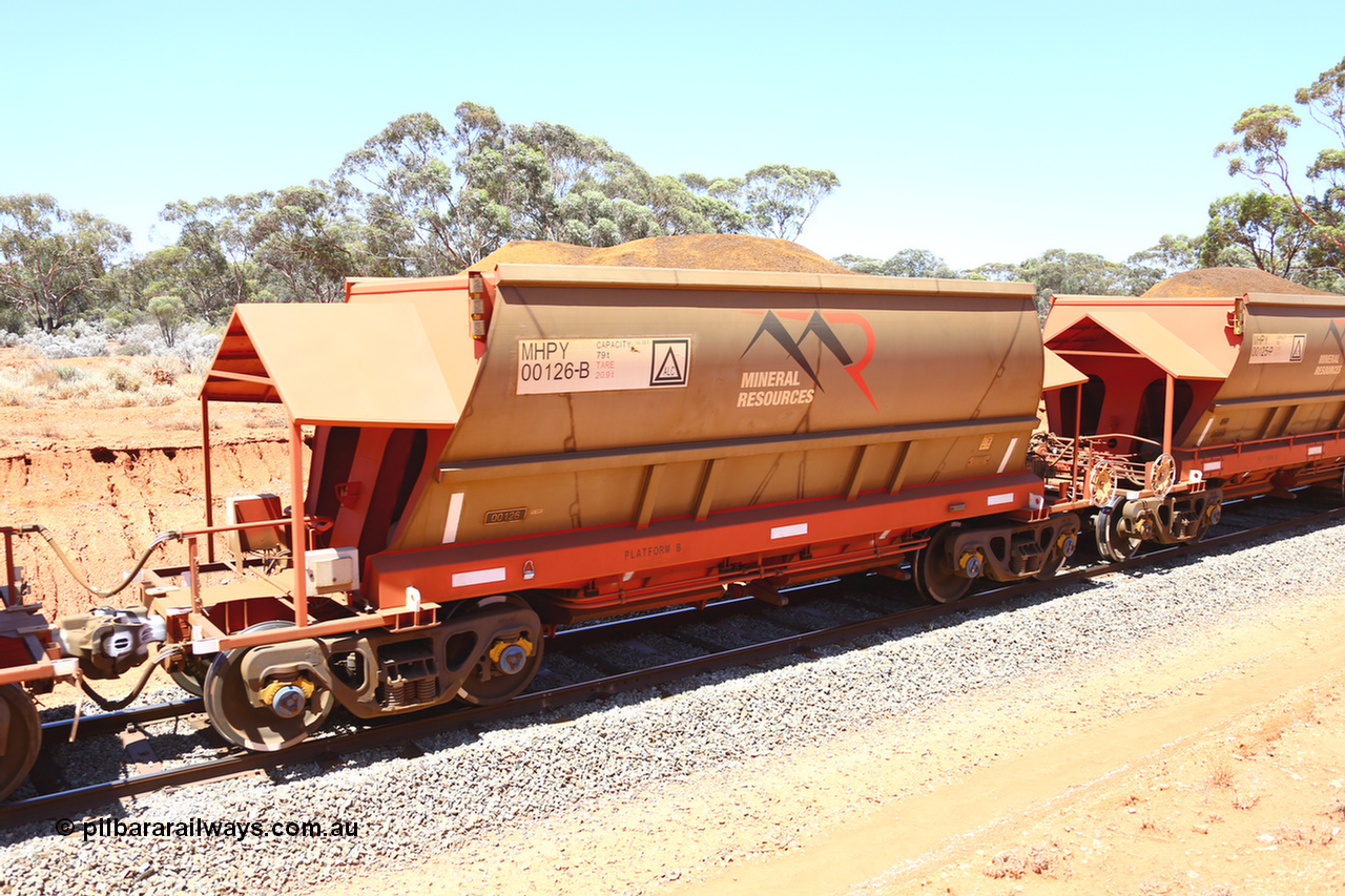 190129 4233
Binduli, on Mineral Resources Ltd loaded iron ore train service from Koolyanobbing to Esperance #3033 with MRL's MHPY type iron ore waggon MHPY 00126 built by CSR Yangtze Co China serial 2014/382-126 in 2014 as a batch of 382 units, these bottom discharge hopper waggons are operated in 'married' pairs.
Keywords: MHPY-type;MHPY00126;2014/382-126;CSR-Yangtze-Co-China;