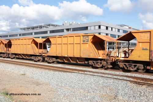 140601 4622
Midland, loaded iron ore train #1030 heading to Kwinana, CFCLA leased CHEY type waggon CHEY 8042 one pair of 120 bar coupled pairs built by Bluebird Rail Operations SA in 2011-12. June 1, 2014.
Keywords: CHEY-type;CHEY8042;Bluebird-Rail-Operations-SA;2011/120-42;