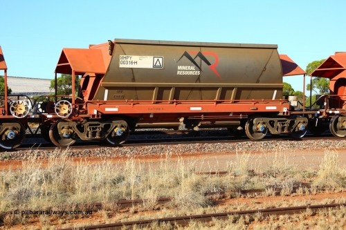 190107 0434
Parkeston, Mineral Resources Ltd MHPY type iron ore waggon MHPY 00316 built by CSR Yangtze Co China in 2014 as a batch of 382 units, these bottom discharge hopper waggons are operated in 'married' pairs.
Keywords: MHPY-type;MHPY00316;2014/382-316;CSR-Yangtze-Rolling-Stock-Co-China;