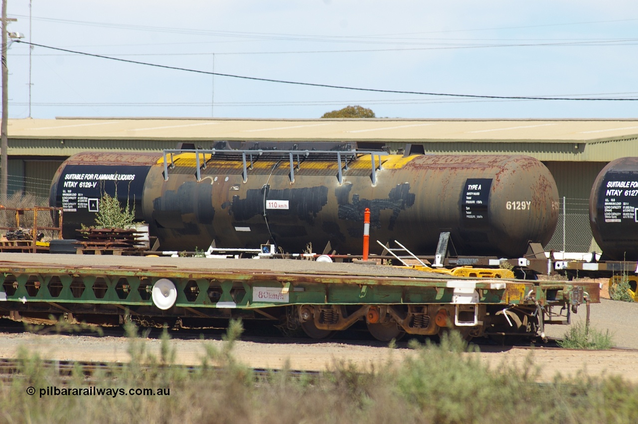 121202 IMG P11607
West Kalgoorlie, NTAY type tank waggon NTAY 6129, built by Industrial Engineering Qld in 1976 as an SCA type SCA 280 for Shell. Recoded to NTAF 280, then 6129, capacity of 61,300 litres. Peter Donaghy image.
Keywords: Peter-D-Image;NTAY-type;NTAY6129;Indeng-Qld;SCA-type;SCA280;NTAF-type;