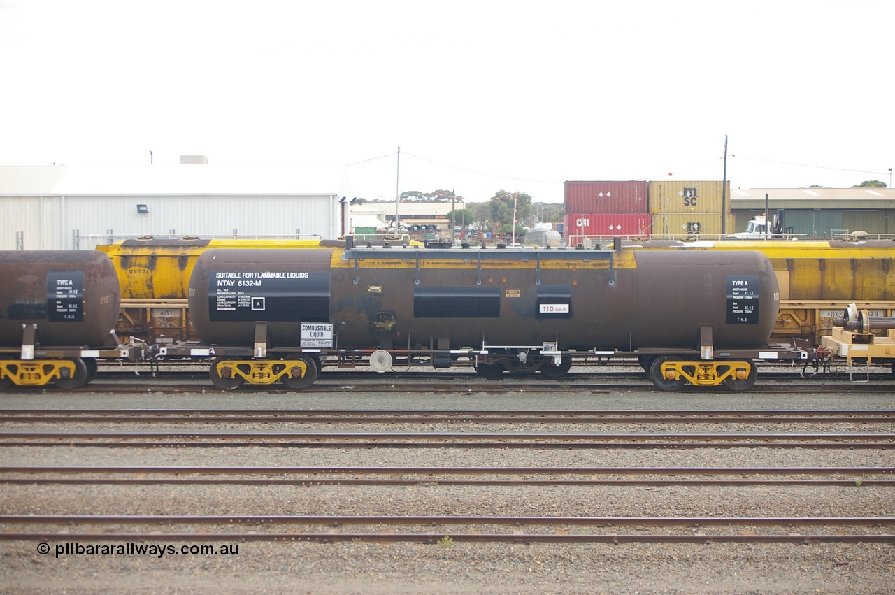 121210 IMG P11783
West Kalgoorlie, NTAY 6132 fuel tank waggon, built by Industrial Engineering Qld in 1976 as an SCA type SCA 283 for Shell. Recoded to NTAF 283, then 6132, capacity of 61,300 litres. Peter Donaghy image.
Keywords: Peter-D-Image;NTAY-type;NTAY6132;Indeng-Qld;SCA-type;SCA283;NTAF-type;