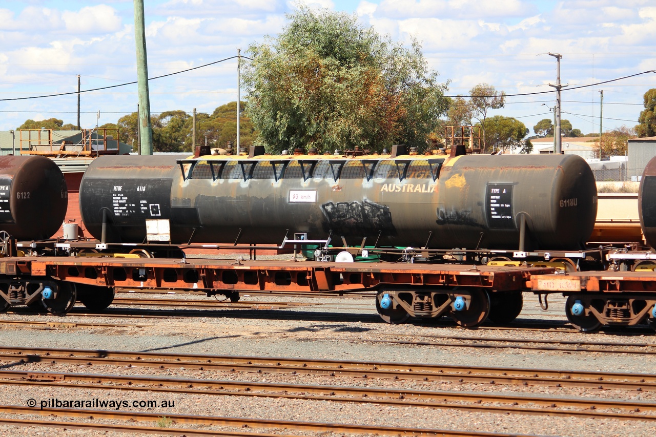 140406 IMG 1928
West Kalgoorlie, NTBF type fuel tank waggon NTBF 6118, with former owners name (Freight Australia) visible. Originally built by Comeng NSW in 1975 as an SCA type 69,000 litre bitumen tank waggon SCA 267 for Shell NSW. Peter Donaghy image.
Keywords: Peter-D-Image;NTBF-type;NTBF6118;Comeng-NSW;SCA-type;SCA267;