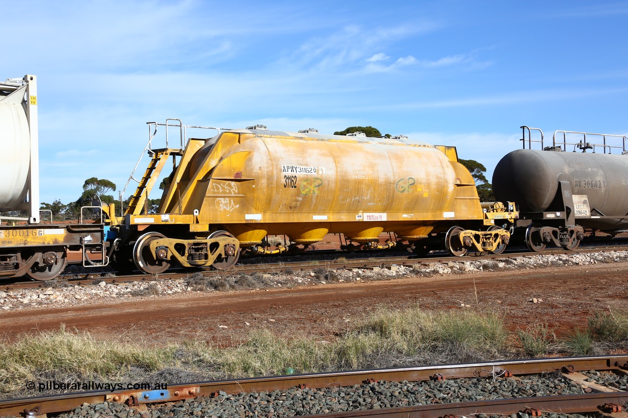 160523 2794
Parkeston, APNY 31162, final one of twelve built by WAGR Midland Workshops in 1974 as WNA type pneumatic discharge nickel concentrate waggon, WAGR built and owned copies of the AE Goodwin built WN waggons for WMC.
Keywords: APNY-type;APNY31162;WAGR-Midland-WS;WNA-type;