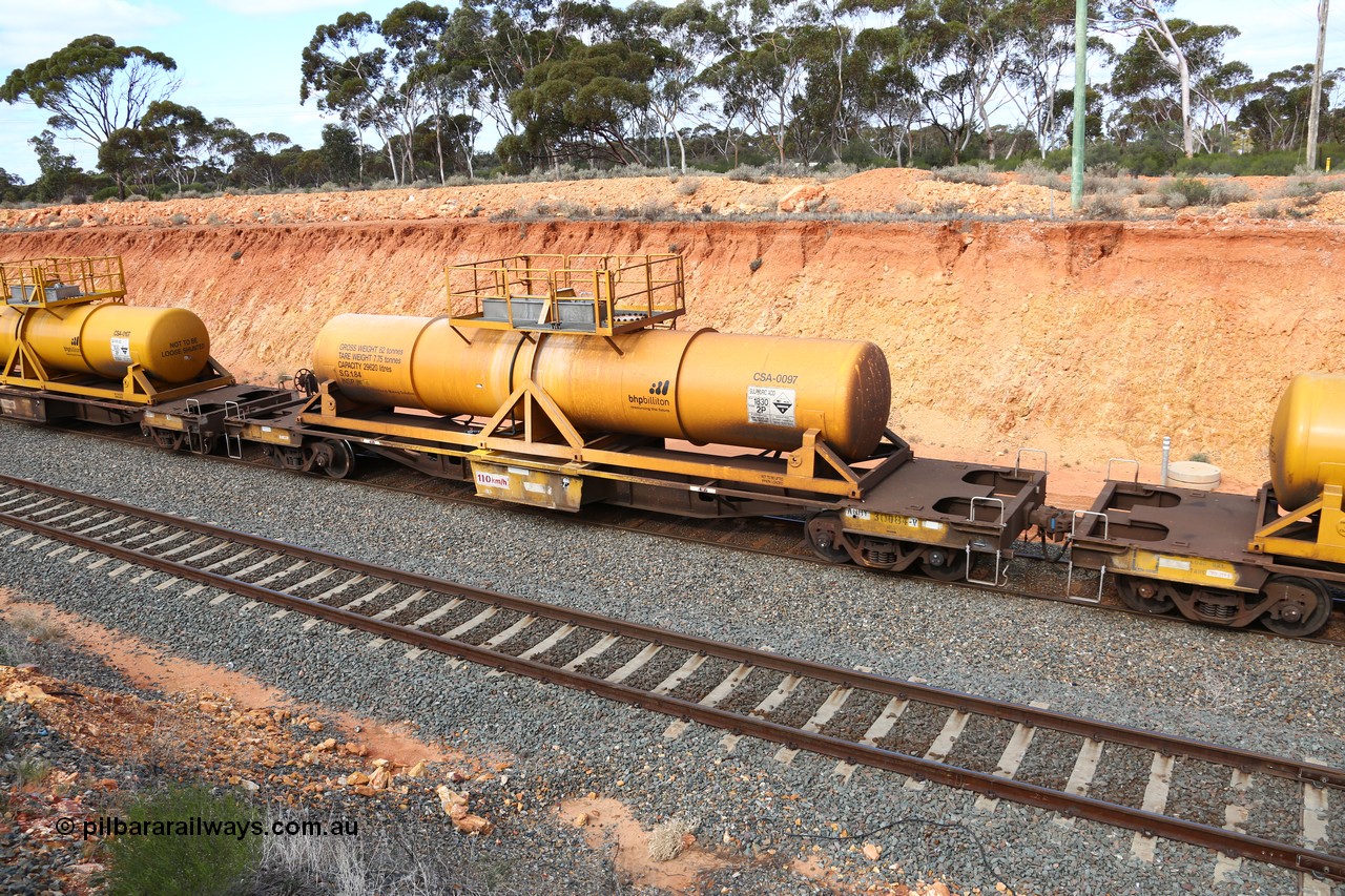 160525 4804
West Kalgoorlie, AQHY 30084 with sulphuric acid tank CSA 0097, originally built by WAGR Midland Workshops in 1964/66 as a WF type flat waggon, then in 1997, following several recodes and modifications, was one of seventy five waggons converted to the WQH type to carry CSA sulphuric acid tanks between Hampton/Kalgoorlie and Perth/Kwinana, part of empty acid train 4405 departing in the yard. CSA 0097 was built by Vcare Engineering, India for Access Petrotec & Mining Solutions in 2015.
Keywords: AQHY-type;AQHY30084;WAGR-Midland-WS;WF-type;WFDY-type;WFDF-type;RFDF-type;WQH-type;