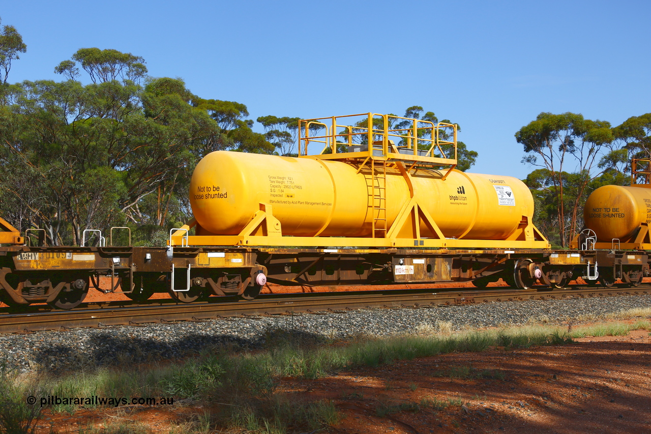 190108 1152
Binduli, AQHY 30013 with CSA 0077, originally built by the WAGR Midland Workshops in 1964/66 as a WF type flat waggon, then in 1997, following several recodes and modifications, was one of seventy five waggons converted to the WQH type to carry CSA sulphuric acid tanks between Hampton/Kalgoorlie and Perth/Kwinana. CSA 0077 was built by Acid Plant Management Services, WA.
Keywords: AQHY-type;AQHY30013;WAGR-Midland-WS;WF-type;WFW-type;WFDY-type;WFDF-type;RFDF-type;WQH-type;