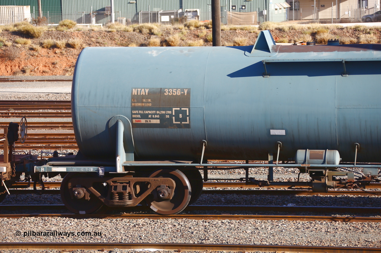 190108 1286
West Kalgoorlie, NTAY type fuel tank waggon NTAY 3356 with 64,200 litre capacity for Caltex. Refurbished by Gemco WA in Nov 2013 from a Caltex NTAF type tank waggon NTAF 356 originally built by Comeng NSW in 1974 as a CTX type CTX 356. Shows B end.
Keywords: NTAY-type;NTAY3356;Comeng-NSW;CTX-type;CTX356;NTAF-type;