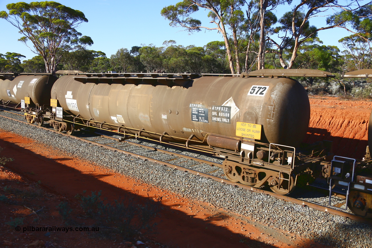 190109 1698
Binduli, empty fuel train 4445, ATPF type tank waggon ATPF 572, built by WAGR Midland Workshops 1974 for Shell as WJP type 80.66 kL one compartment one dome, old code still visible, fitted with type F InterLock couplers. Under Viva Energy ownership.
Keywords: ATPF-type;ATPF572;WAGR-Midland-WS;WJP-type;