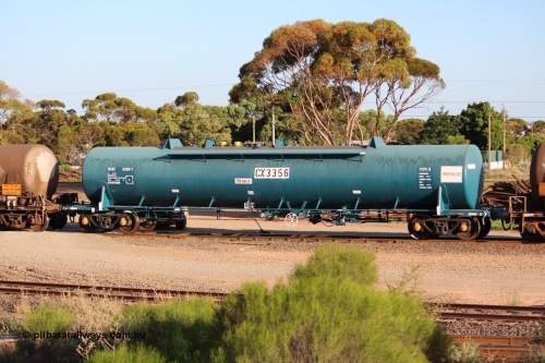 140205 IMG 1462
West Kalgoorlie, NTAY type fuel tank waggon NTAY 3356 with 64,200 litre capacity for Caltex. Refurbished by Gemco WA in Nov 2013 from a Caltex NTAF type tank waggon NTAF 356 originally built by Comeng NSW in 1974 as a CTX type CTX 356. Peter Donaghy image.
Keywords: Peter-D-Image;NTAY-type;NTAY3356;Comeng-NSW;CTX-type;CTX356;NTAF-type;