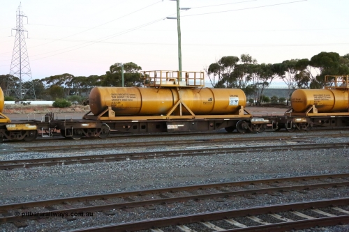 160523 3603
West Kalgoorlie, misnumbered AQHY 30088, plate shows AQHY 3008 L, with sulphuric acid tank CSA 0126, originally built by WAGR Midland Workshops in 1964/66 as a WF type flat waggon, then in 1997, following several recodes and modifications, was one of seventy five waggons converted to the WQH type to carry CSA sulphuric acid tanks between Hampton/Kalgoorlie and Perth/Kwinana, part of loaded acid train 2406 arriving back in the yard. CSA 0126 was built by VCare Engineering, India for Access Petrotec & Mining Solutions in 2015.
Keywords: AQHY-type;AQHY30088;WAGR-Midland-WS;WF-type;WFDY-type;WFDF-type;RFDF-type;WQH-type;