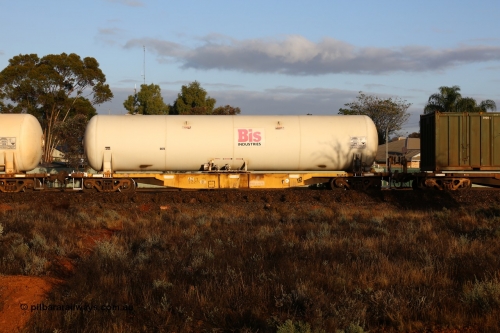 160525 4399
Kalgoorlie, Malcolm freighter, train 3029, AZKY type anhydrous ammonia tank waggon AZKY 32235, one of twelve built by Goninan WA in 1998 as type WQK for Murrin Murrin traffic, fitted with Bis Industries anhydrous ammonia tank A7S.
Keywords: AZKY-type;AZKY32235;Goninan-WA;WQK-type;