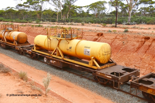 190109 1414
Binduli, AQHY 30025 with CSA 0087, originally built by the WAGR Midland Workshops in 1964/66 as a WF type flat waggon, then in 1997, following several recodes and modifications, was one of seventy five waggons converted to the WQH type to carry CSA sulphuric acid tanks between Hampton/Kalgoorlie and Perth/Kwinana. CSA 0087 was built by Acid Plant Management Services, WA.
Keywords: AQHY-type;AQHY30025;WAGR-Midland-WS;WF-type;WMA-type;WFDY-type;WFDF-type;RFDF-type;WQH-type;