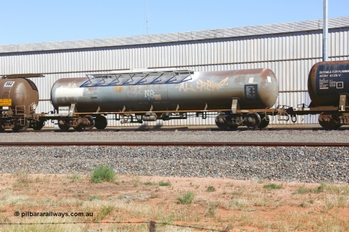 190109 1449
West Kalgoorlie, RHTY type tank waggon RHTY 663, one of twelve such waggons built by Industrial Engineering Qld in 1976 for Victorian Railways as TWX type crude benzene tank 56,000 litres. Recoded to VTHX in 1979. After a period of storage ended up in National Rail ownership for Alice Springs traffic, now Pacific National ownership.
Keywords: RHTY-type;RHTY663;Indeng-Qld;TWX-type;VTHX-type;