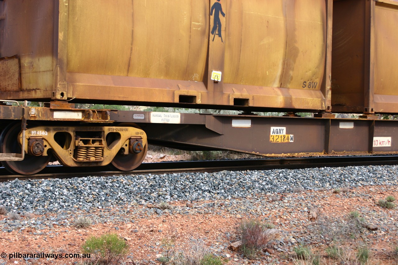 060117 2714
Bardoc, AQNY 32184, one of sixty two waggons built by Goninan WA in 1998 as WQN type for Murrin Murrin container traffic, view of number board and bogie, sulphur skip S8W, train 2029 loaded Malcolm freighter.
Keywords: AQNY-type;AQNY32184;Goninan-WA;WQN-type;