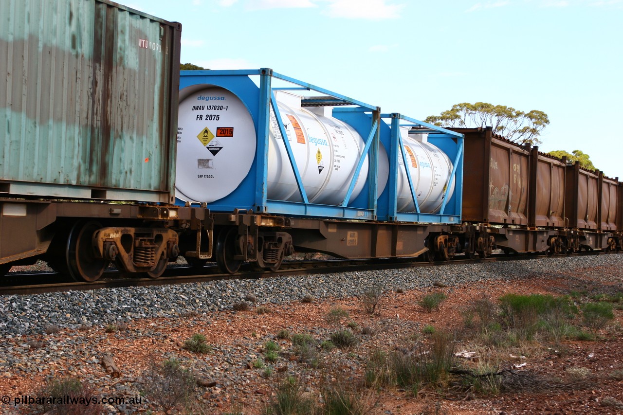 060117 2716
Bardoc, AQNY 32197, one of sixty two waggons built by Goninan WA in 1998 as WQN type for Murrin Murrin container traffic, with two Degussa 20' tank tainers DWAU 137030 and a similar unit, train 2029 loaded Malcolm freighter.
Keywords: AQNY-type;AQNY32197;Goninan-WA;WQN-type;