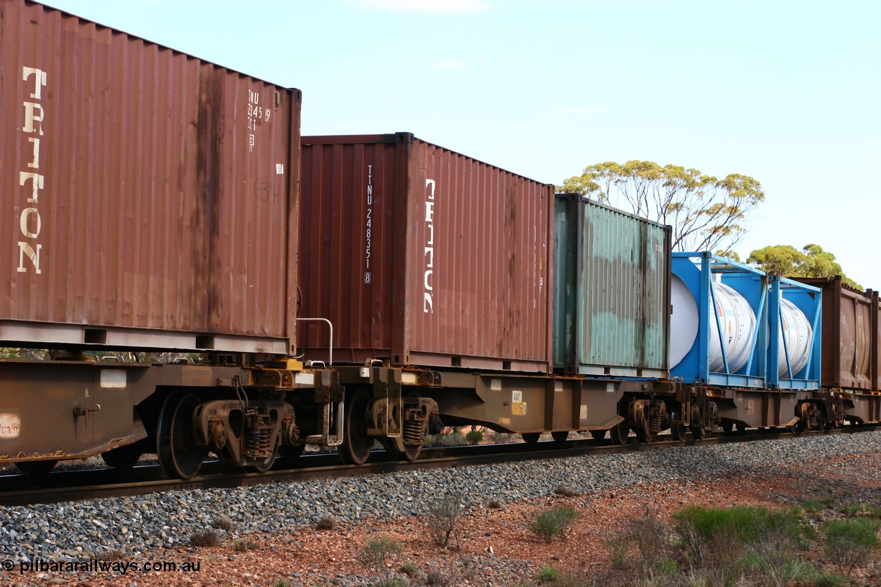 060117 2717
Bardoc, AQNY 32152, one of sixty two waggons built by Goninan WA in 1998 as WQN type for Murrin Murrin container traffic, with two 20' containers Triton TTNU 248351 and Royal Wolf RWTU 0093, train 2029 loaded Malcolm freighter.
Keywords: AQNY-type;AQNY32152;Goninan-WA;WQN-type;