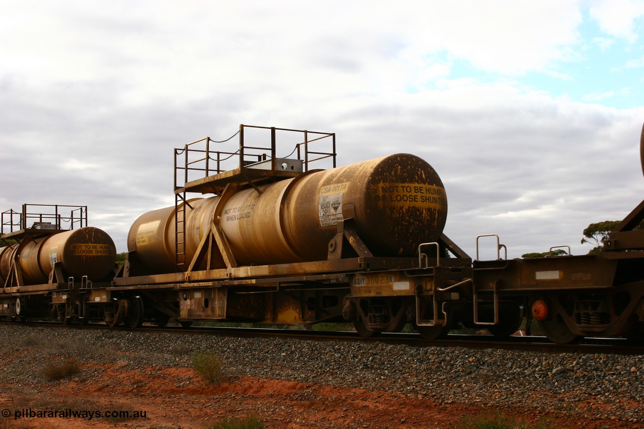 060527 4090
Scotia, AQHY 30023 with sulphuric acid tank CSA 0017, originally built by the WAGR Midland Workshops in 1964/66 as a WF type flat waggon, then in 1997, following several recodes and modifications, was one of seventy five waggons converted to the WQH type to carry CSA sulphuric acid tanks between Hampton/Kalgoorlie and Perth/Kwinana.
Keywords: AQHY-type;AQHY30023;WAGR-Midland-WS;WF-type;WFDY-type;WFDF-type;RFDF-type;WQH-type;