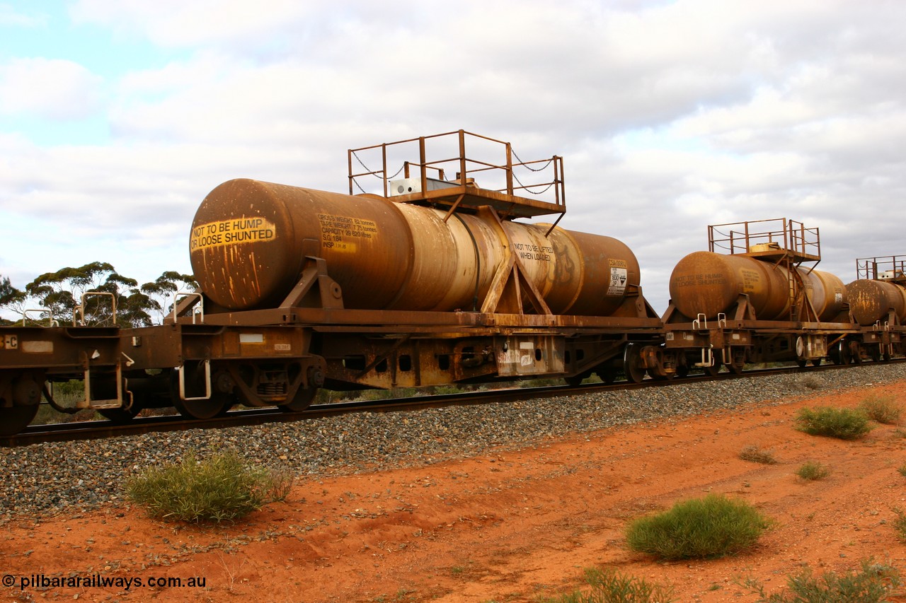 060527 4091
Scotia, AQHY 30077 with sulphuric acid tank CSA 0061, originally built by the WAGR Midland Workshops in 1964/66 as a WF type flat waggon, then in 1997, following several recodes and modifications, was one of seventy five waggons converted to the WQH type to carry CSA sulphuric acid tanks between Hampton/Kalgoorlie and Perth/Kwinana.
Keywords: AQHY-type;AQHY30077;WAGR-Midland-WS;WF-type;WFDY-type;WFDF-type;RFDF-type;WQH-type;