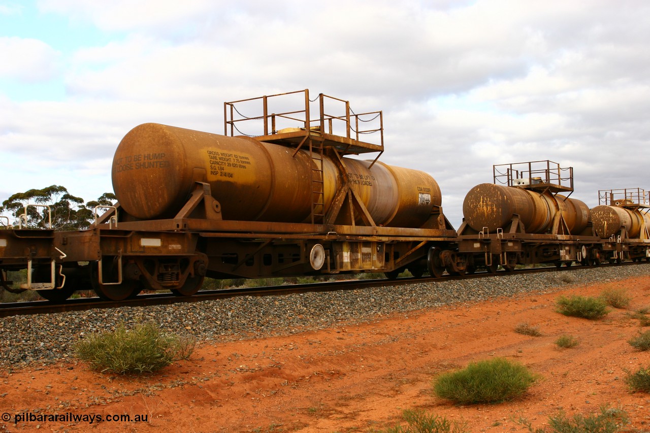 060527 4092
Scotia, AQHY 30060 with sulphuric acid tank CSA 0032, originally built by the WAGR Midland Workshops in 1964/66 as a WF type flat waggon, then in 1997, following several recodes and modifications, was one of seventy five waggons converted to the WQH type to carry CSA sulphuric acid tanks between Hampton/Kalgoorlie and Perth/Kwinana.
Keywords: AQHY-type;AQHY30060;WAGR-Midland-WS;WF-type;WFL-type;WFDY-type;WFDF-type;RFDF-type;WQH-type;