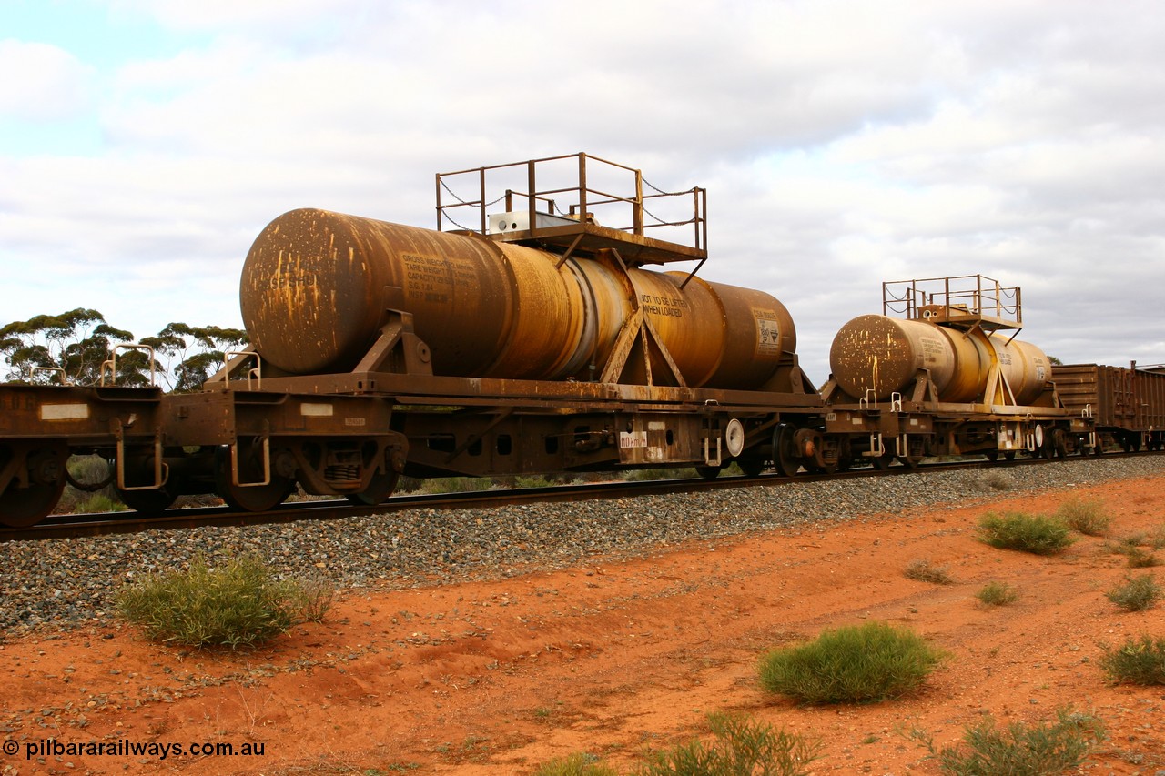 060527 4093
Scotia, AQHY 30050 with sulphuric acid tank CSA 0063, originally built by the WAGR Midland Workshops in 1964/66 as a WF type flat waggon, then in 1997, following several recodes and modifications, was one of seventy five waggons converted to the WQH type to carry CSA sulphuric acid tanks between Hampton/Kalgoorlie and Perth/Kwinana.
Keywords: AQHY-type;AQHY30050;WAGR-Midland-WS;WF-type;WFDY-type;WFDF-type;RFDF-type;WQH-type;