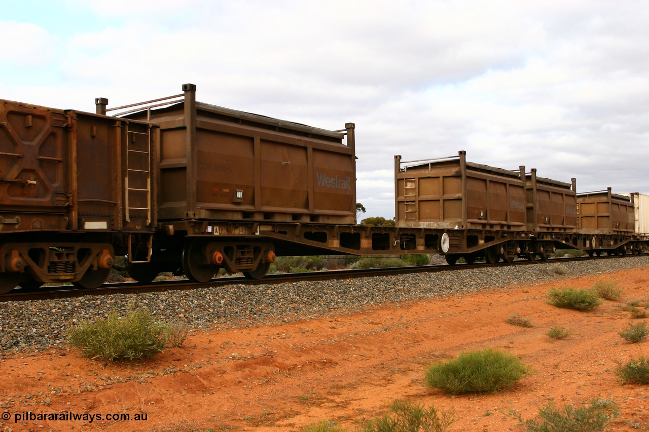 060527 4096
Scotia, AQCY 30348 container waggon, originally built by Tomlinson Steel WA as WFX type in 1970 from a batch of one hundred and sixty one waggons, to narrow gauge as QWF type in 1970, back to SG in 1972 as WFX, recoded in 1979 to WQCX type. With two COR type nickel residue containers with modified tops, COR 5818 and another.
Keywords: AQWY-type;AQWY30348;Tomlinson-Steel-WA;WFX-type;QWF-type;WQCX-type;