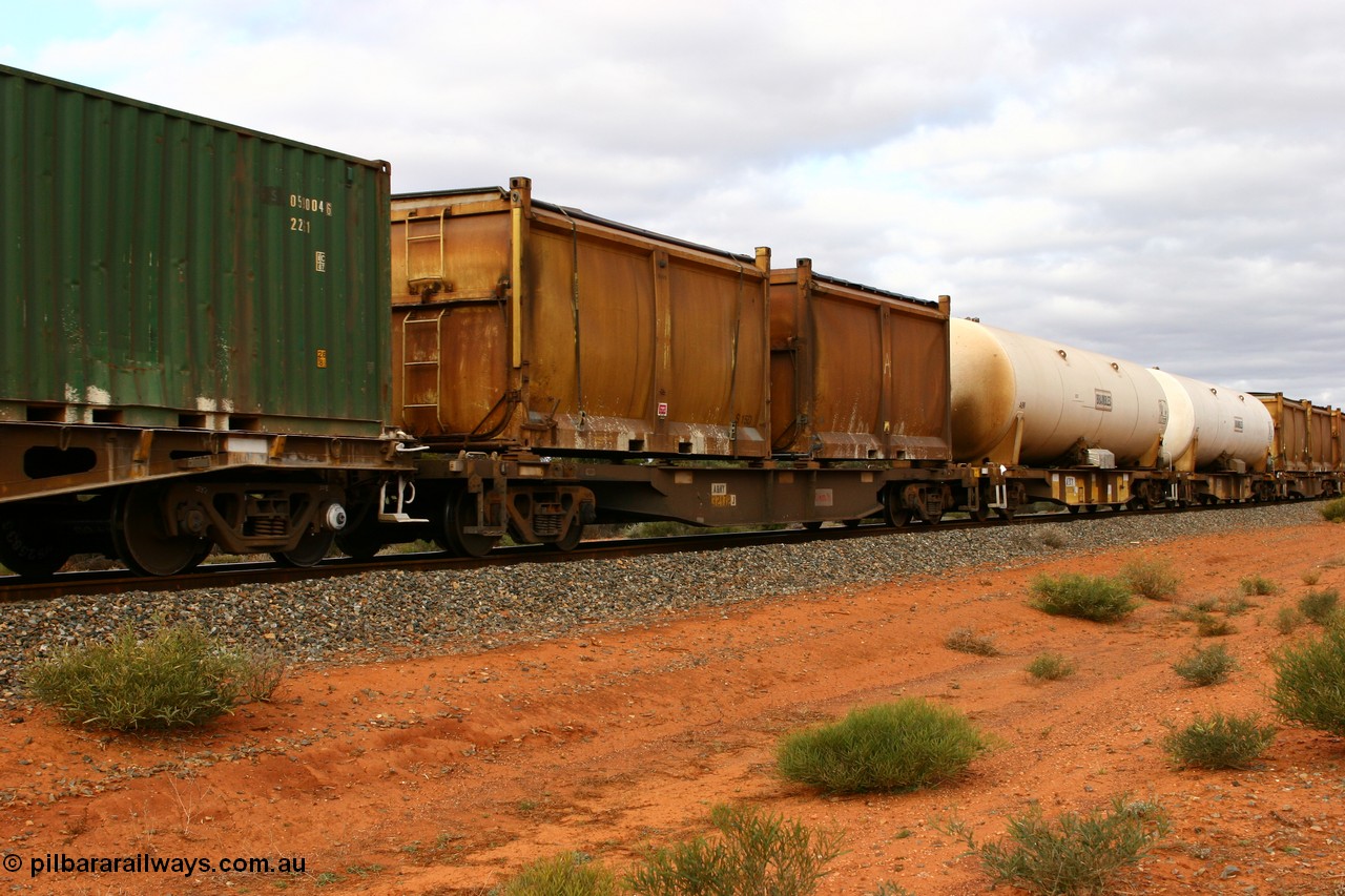 060527 4099
Scotia, AQNY 32172, one of sixty two waggons built by Goninan WA in 1998 as WQN type for Murrin Murrin container traffic, with sulphur skips S15D and S97Q both with original style doors, S15D has a modified top with tarpaulin lashed to sides, while S97Q has the original sliding tarpaulin, train 6029 loaded Malcolm freighter.
Keywords: AQNY-type;AQNY32172;Goninan-WA;WQN-type;