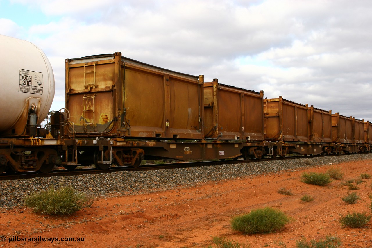 060527 4102
Scotia, AQNY 32176, one of sixty two waggons built by Goninan WA in 1998 as WQN type for Murrin Murrin container traffic, with sulphur skips S199A with original style door and modified top with tarpaulin lashed to sides, and S106L with original door and slide top tarpaulin on train 6029 loaded Malcolm freighter.
Keywords: AQNY-type;AQNY32176;Goninan-WA;WQN-type;