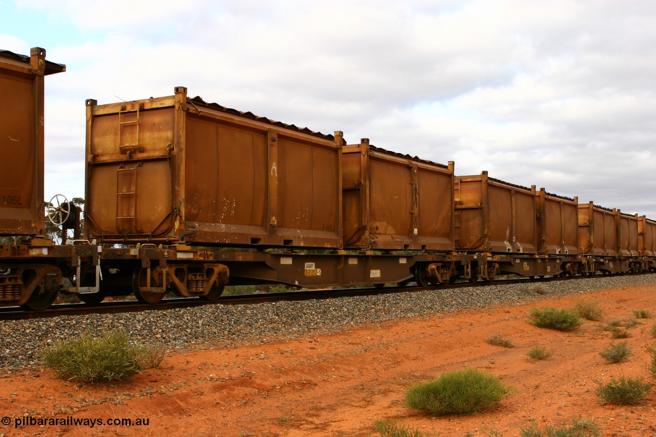 060527 4103
Scotia, AQNY 32212, final one of sixty two waggons built by Goninan WA in 1998 as WQN type for Murrin Murrin container traffic, with sulphur skips S44S and S40F both with original style doors and sliding tarpaulins, train 6029 loaded Malcolm freighter.
Keywords: AQNY-type;AQNY32212;Goninan-WA;WQN-type;