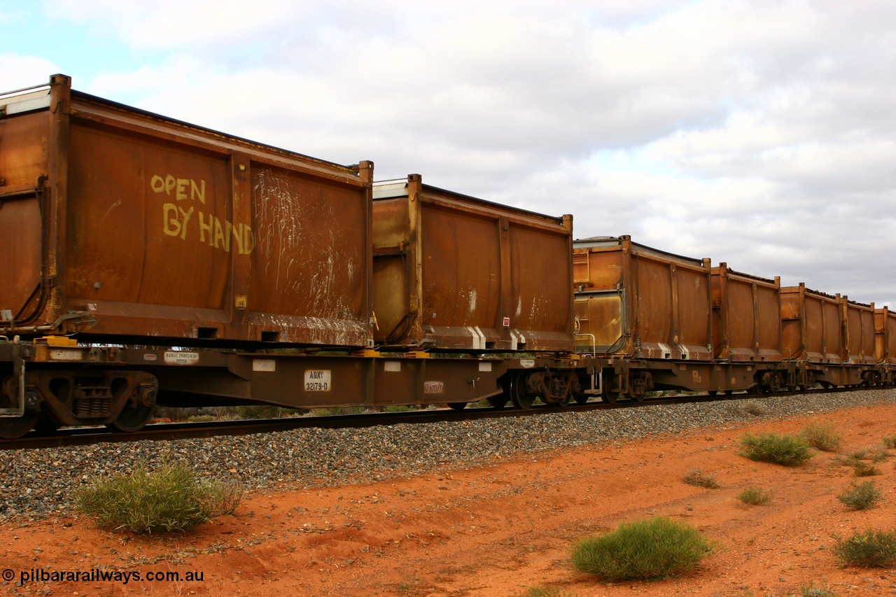 060527 4110
Scotia, AQNY 32179, one of sixty two waggons built by Goninan WA in 1998 as WQN type for Murrin Murrin container traffic, with sulphur skips S38A and S73K with original doors and modified top tarpaulins, S38A also stencilled 'OPEN BY HAND', train 6029 loaded Malcolm freighter.
Keywords: AQNY-type;AQNY32179;Goninan-WA;WQN-type;