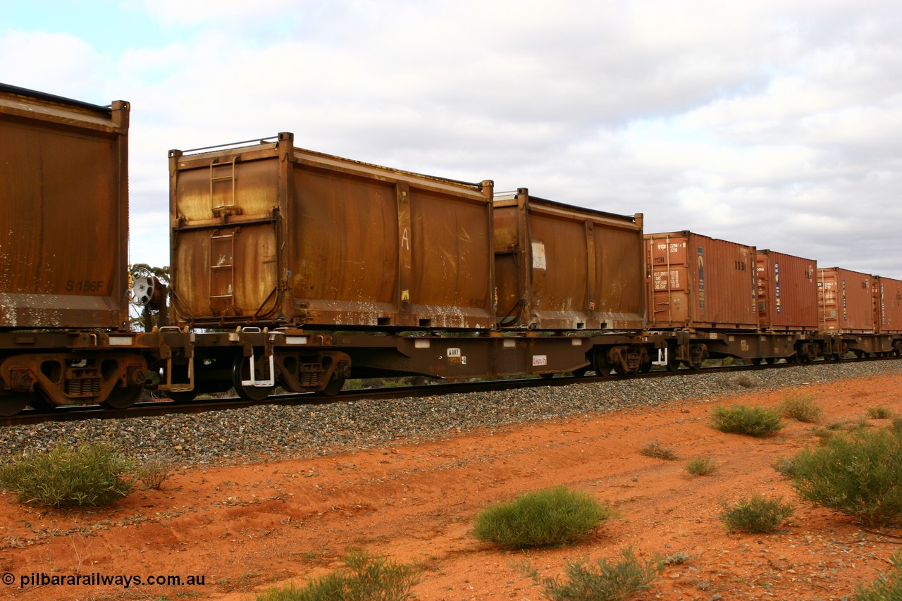 060527 4113
Scotia, AQNY 32191, one of sixty two waggons built by Goninan WA in 1998 as WQN type for Murrin Murrin container traffic, with sulphur skips S41Y and S84E with original doors and modified tops with tarpaulins, train 6029 loaded Malcolm freighter.
Keywords: AQNY-type;AQNY32191;Goninan-WA;WQN-type;