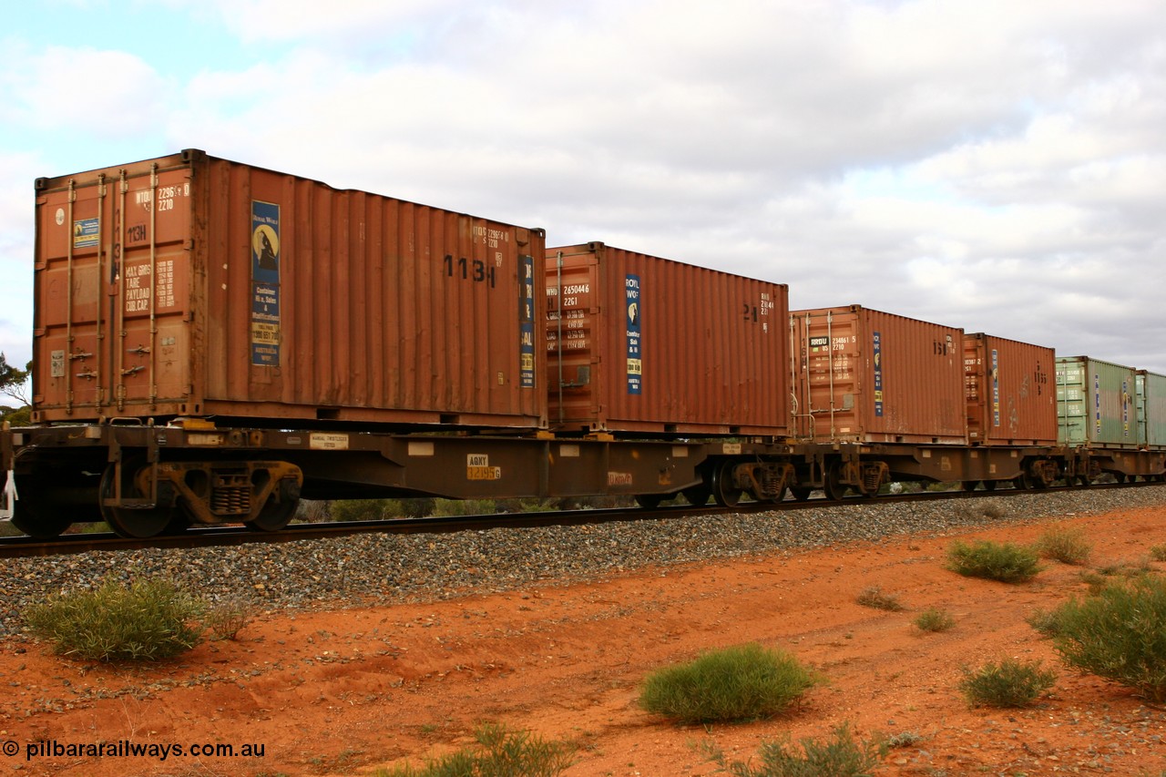 060527 4114
Scotia, AQNY 32195, one of sixty two waggons built by Goninan WA in 1998 as WQN type for Murrin Murrin container traffic, with two Royal Wolf 20' containers WTQU 229658 and RWHU 265044, train 6029 loaded Malcolm freighter.
Keywords: AQNY-type;AQNY32195;Goninan-WA;WQN-type;