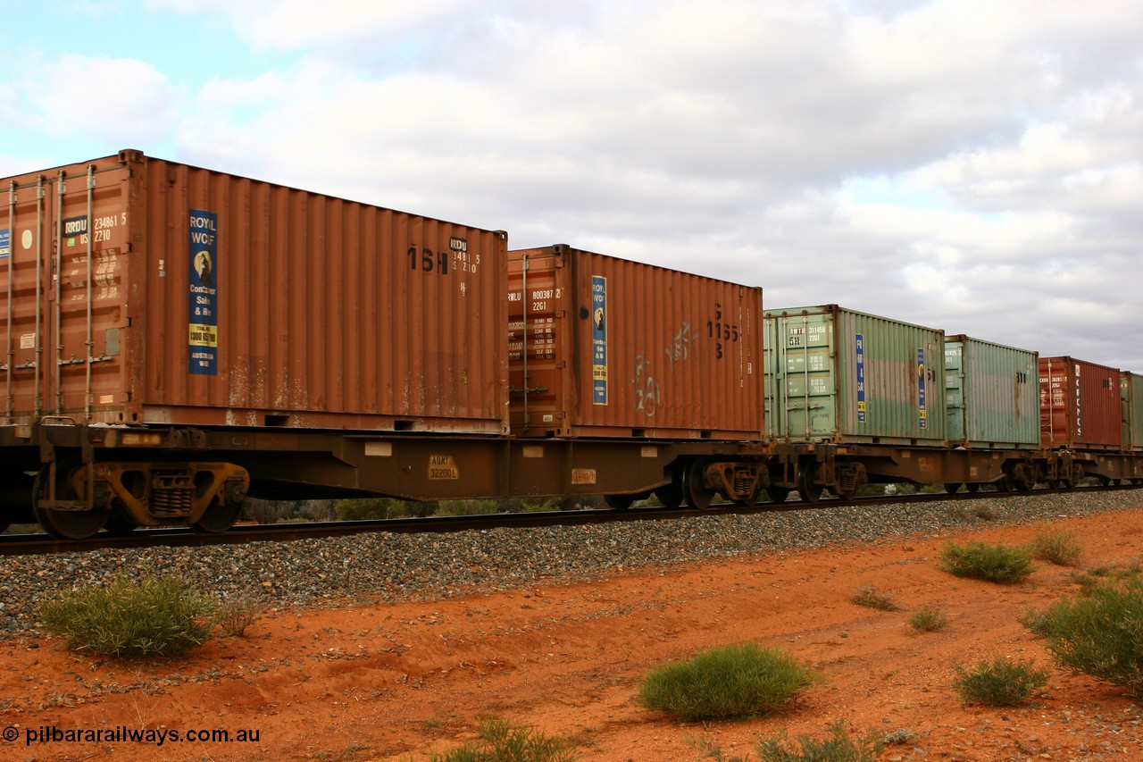 060527 4115
Scotia, AQNY 32200, one of sixty two waggons built by Goninan WA in 1998 as WQN type for Murrin Murrin container traffic, with two Royal Wolf 20' containers RRDU 234861 and RWLU 800387, train 6029 loaded Malcolm freighter.
Keywords: AQNY-type;AQNY32200;Goninan-WA;WQN-type;