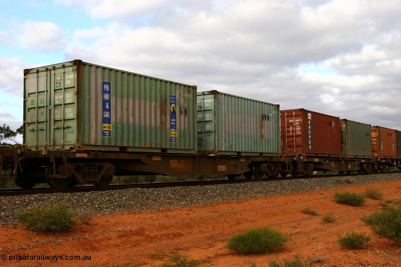 060527 4116
Scotia, AQNY 32186, one of sixty two waggons built by Goninan WA in 1998 as WQN type for Murrin Murrin container traffic, with two Royal Wolf 20' containers RWTU 311459 and RWTU 207425, train 6029 loaded Malcolm freighter.
Keywords: AQNY-type;AQNY32186;Goninan-WA;WQN-type;